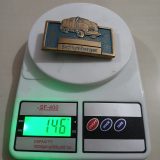 Schlumberger Truck vintage belt buckle – on scale showing weight