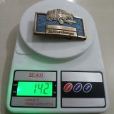 Schlumberger Truck vintage belt buckle – on scale showing weight