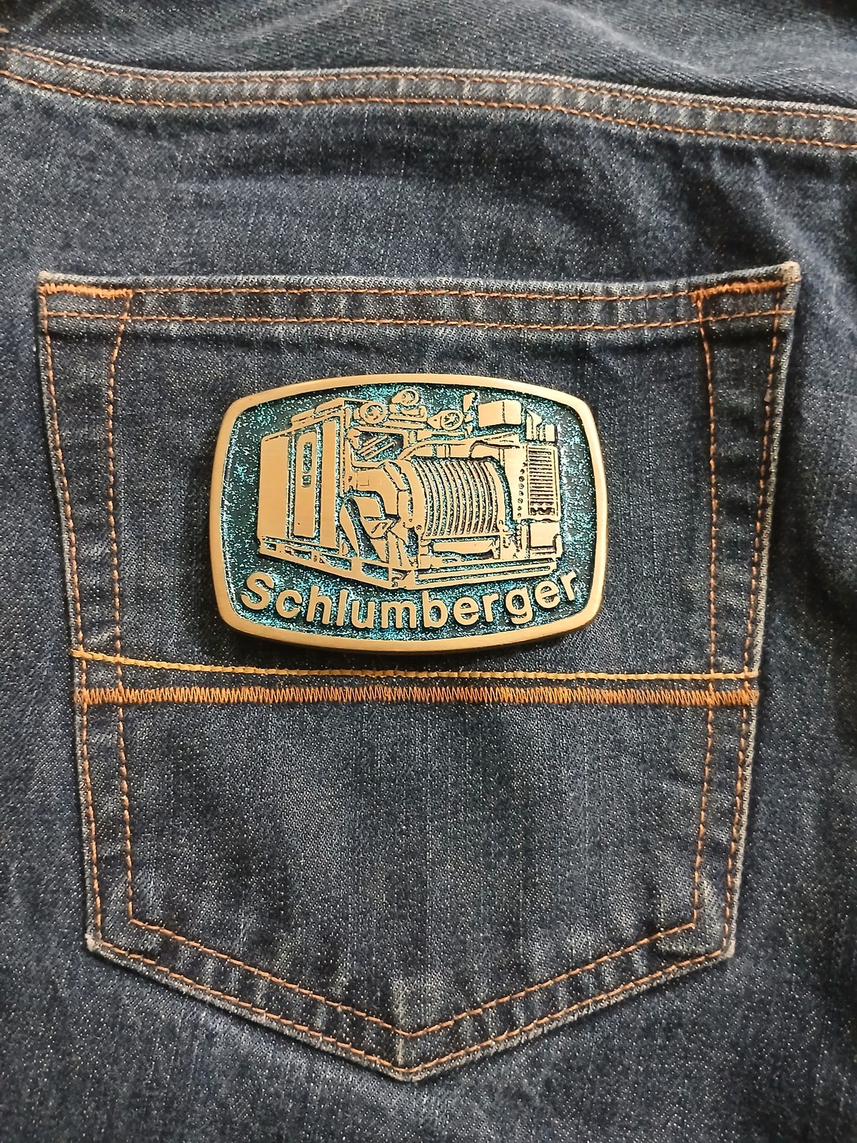 Schlumberger Truck Vintage Belt Buckle – On jeans back pocket Schlumberger Truck vintage belt buckle – on jeans back pocket