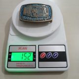 Schlumberger Truck vintage belt buckle – on scale showing weight