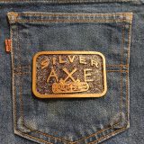 Silver Axe vintage belt buckle – on jeans back pocket
