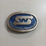 Silver Wheel Freightlines vintage belt buckle – front view