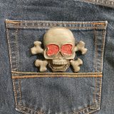 Skull Crossbones vintage belt buckle – on jeans back pocket