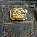 Sleeper Mine AMAX Winnemucca Nevada vintage belt buckle – on jeans back pocket
