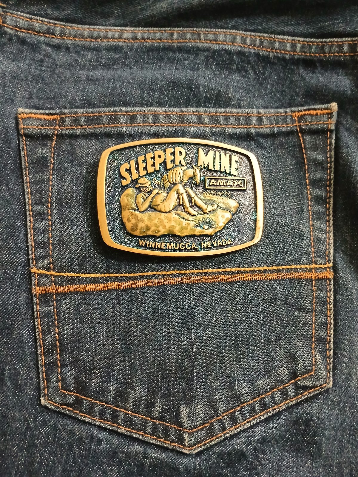 Sleeper Mine AMAX Winnemucca Nevada Vintage Belt Buckle – On jeans back pocket Sleeper Mine AMAX Winnemucca Nevada vintage belt buckle – on jeans back pocket