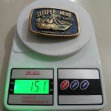 Sleeper Mine AMAX Winnemucca Nevada vintage belt buckle – on scale showing weight
