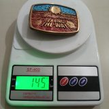 Snap-on Leading The Way vintage belt buckle – on scale showing weight