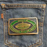 Society of Professional Well Log Analysts vintage belt buckle – on jeans back pocket