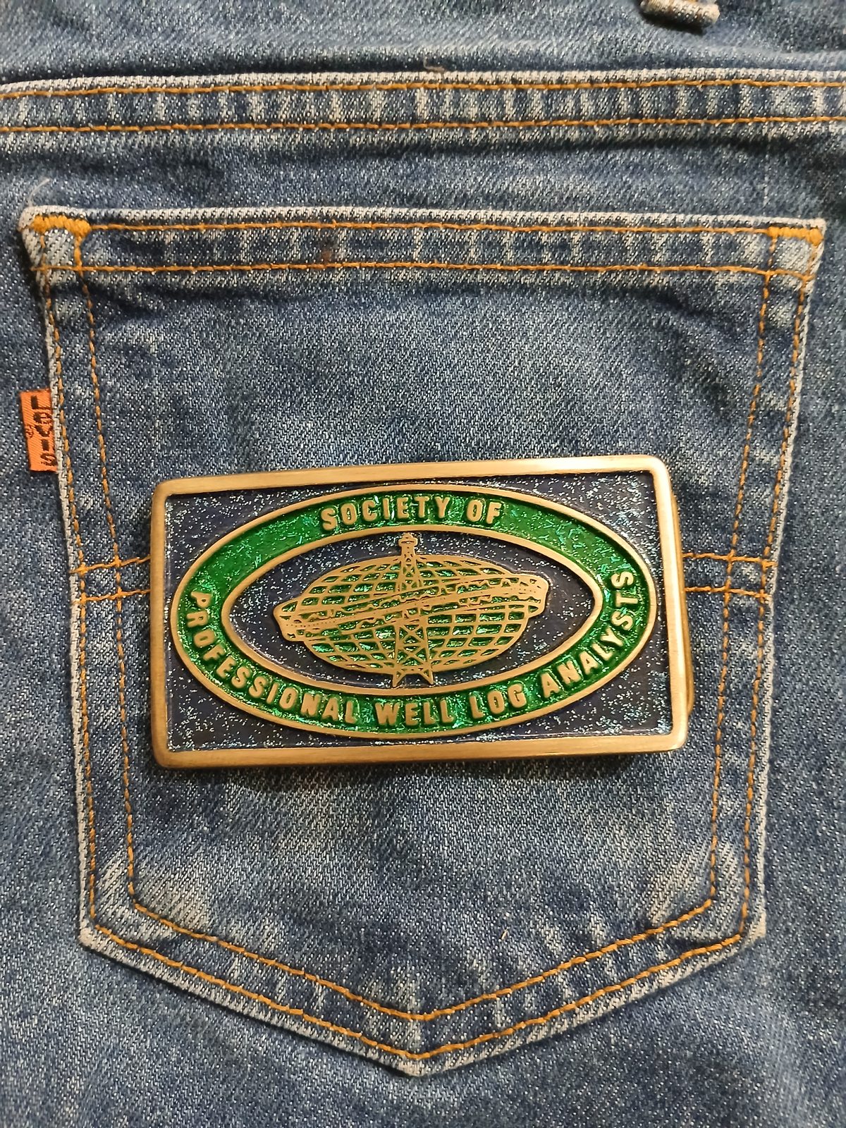 Society of Professional Well Log Analysts Vintage Belt Buckle – On jeans back pocket Society of Professional Well Log Analysts vintage belt buckle – on jeans back pocket