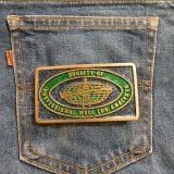 Society of Professional Well Log Analysts vintage belt buckle – on jeans back pocket