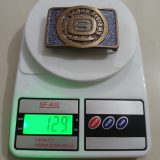 Solus Ocean Systems vintage belt buckle – on scale showing weight