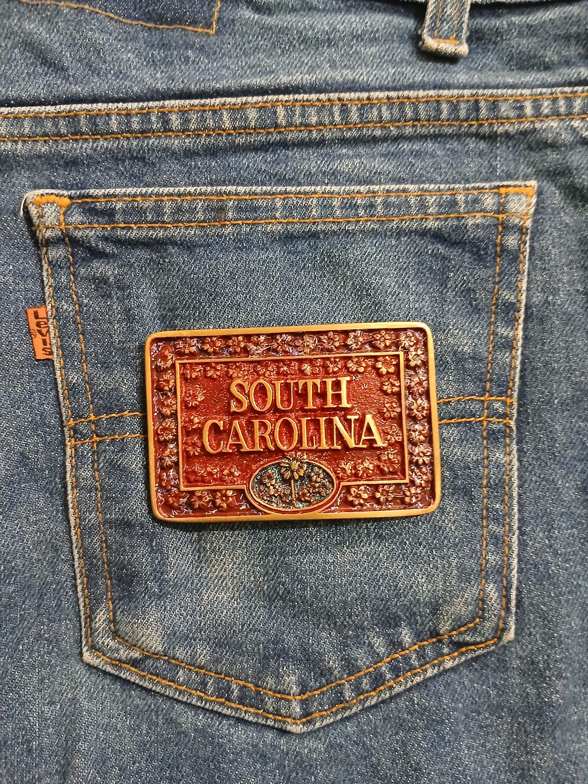 South Carolina Vintage Belt Buckle – On jeans back pocket South Carolina vintage belt buckle – on jeans back pocket