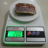 Spokane vintage belt buckle – on scale showing weight