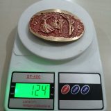 Square Dancers vintage belt buckle – on scale showing weight