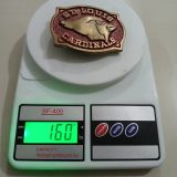 St Louis Cardinals vintage belt buckle – on scale showing weight