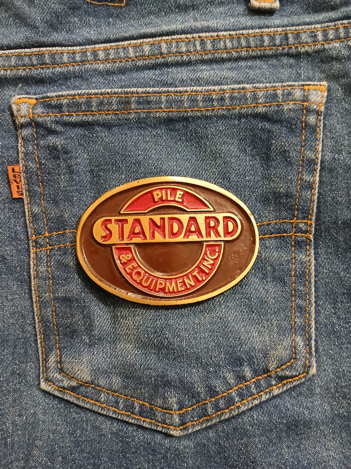 Standard Equipment Inc Vintage Belt Buckle – On jeans back pocket Standard Equipment Inc vintage belt buckle – on jeans back pocket