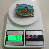 Steam Train vintage belt buckle – on scale showing weight