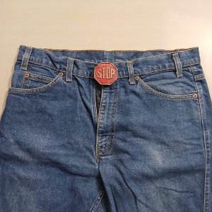 Stop Sign vintage belt buckle – worn on belt with jeans