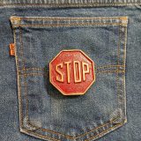Stop Sign vintage belt buckle – on jeans back pocket
