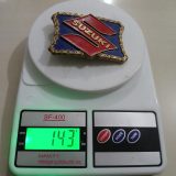 Suzuki vintage belt buckle – on scale showing weight
