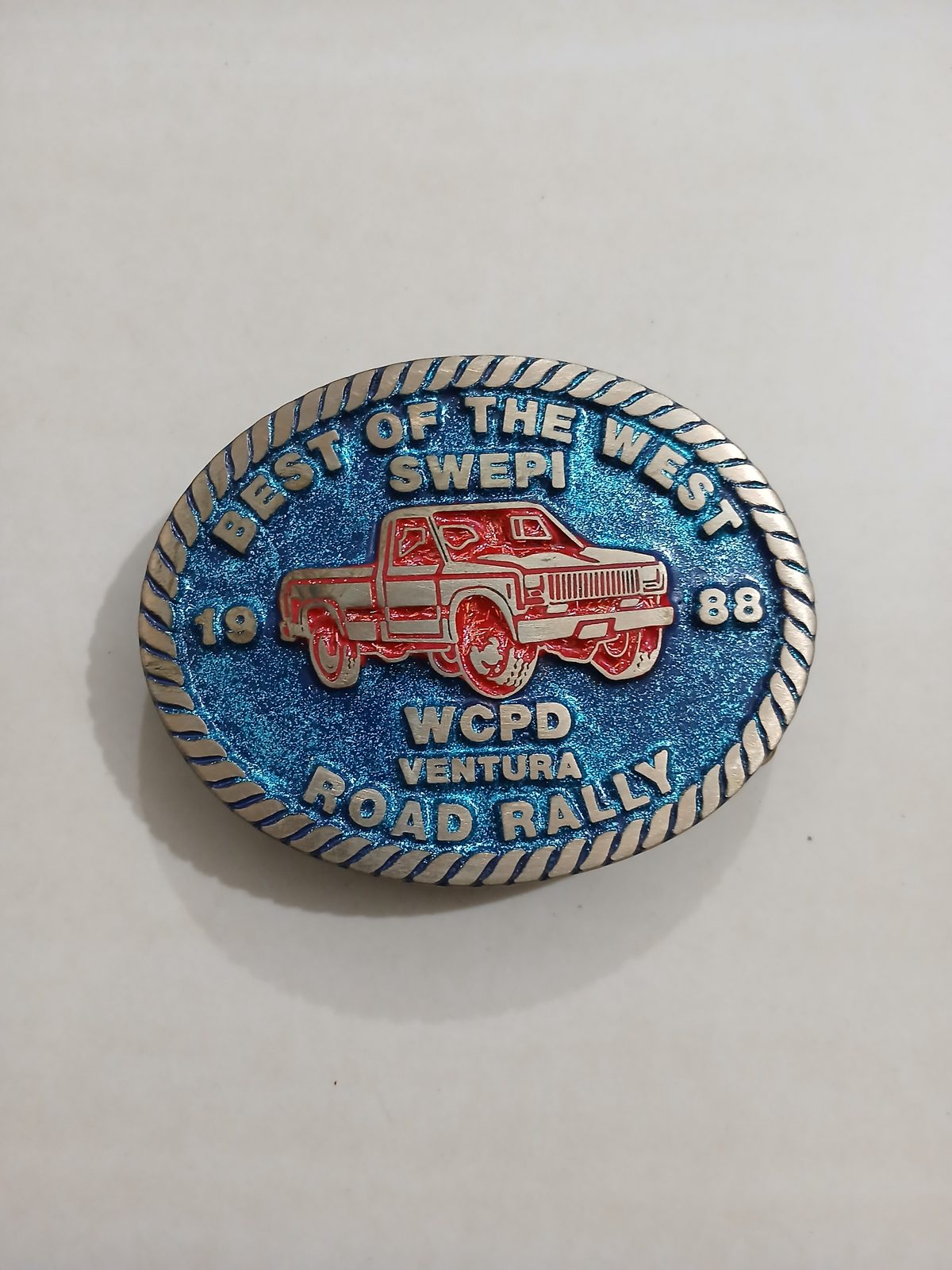 SWEPI Best of the West 1988 Road Rally Vintage Belt Buckle – Front view SWEPI Best of the West 1988 Road Rally vintage belt buckle – front view