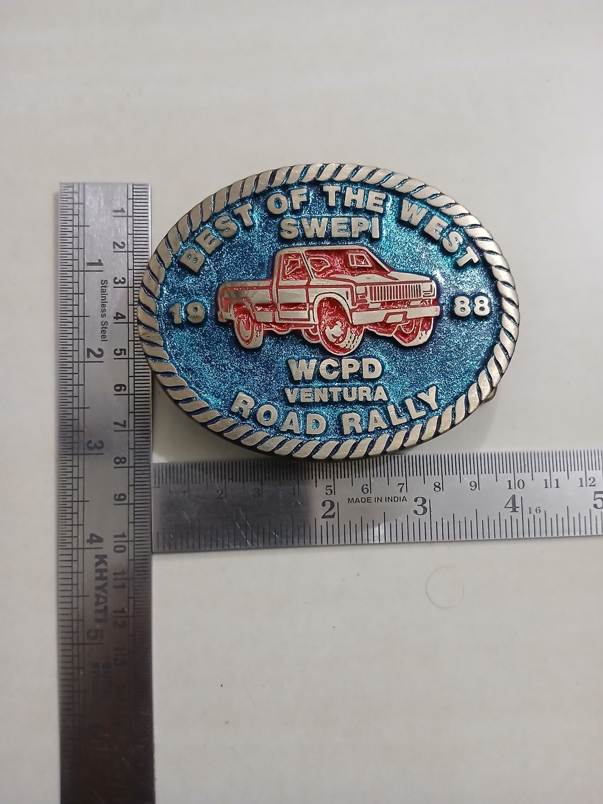 SWEPI Best of the West 1988 Road Rally Vintage Belt Buckle – With ruler for size SWEPI Best of the West 1988 Road Rally vintage belt buckle – with ruler for size