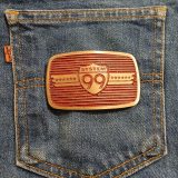 System 99 vintage belt buckle – on jeans back pocket