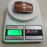 System 99 vintage belt buckle – on scale showing weight