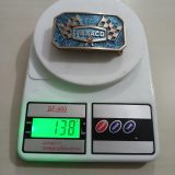 Texaco Racing Flags vintage belt buckle – on scale showing weight