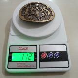 Texas Longhorn Map vintage belt buckle – on scale showing weight