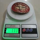 Texas Longhorn vintage belt buckle – on scale showing weight