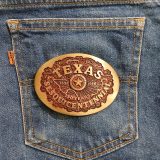 Texas Sesquicentennial 1836-1986 vintage belt buckle – on jeans back pocket
