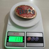 Texas Star vintage belt buckle – on scale showing weight