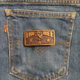 The Bee vintage belt buckle – on jeans back pocket