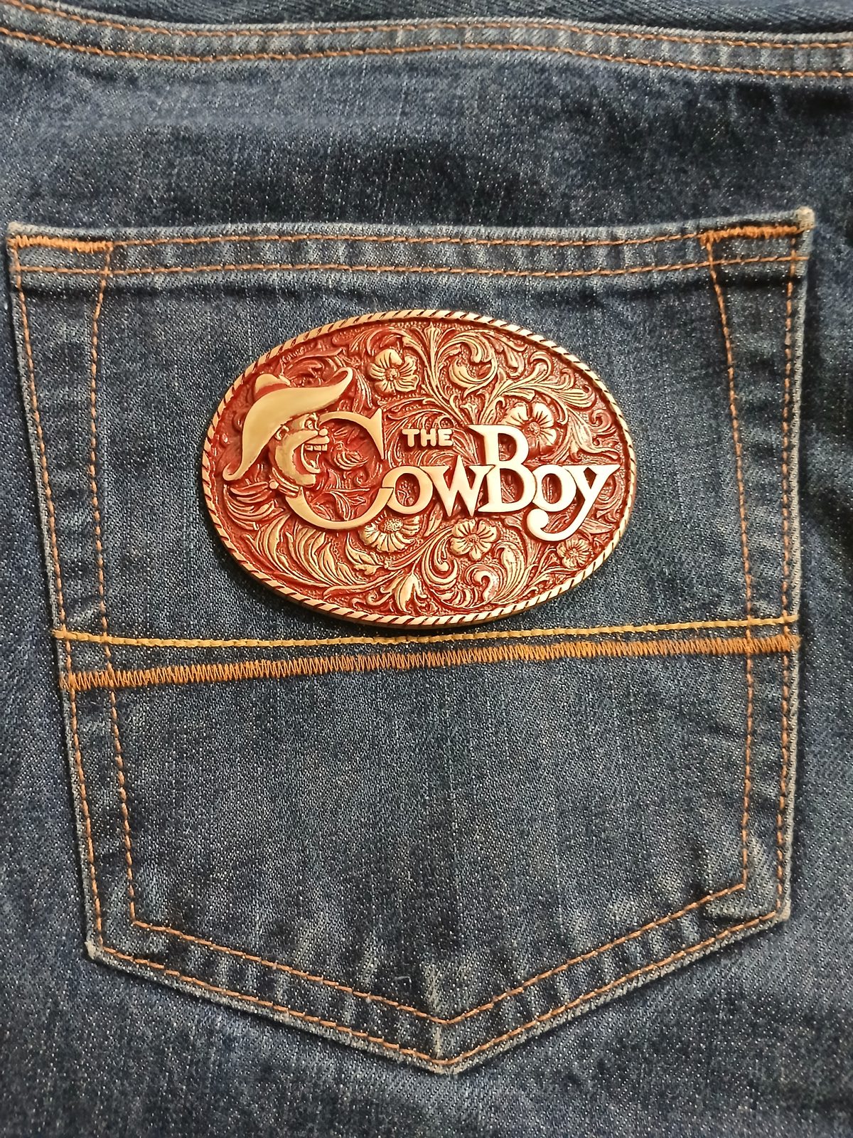 The Cowboy Vintage Belt Buckle – On jeans back pocket The Cowboy vintage belt buckle – on jeans back pocket