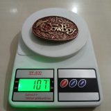 The Cowboy vintage belt buckle – on scale showing weight