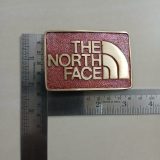 The North Face vintage belt buckle – with ruler for size