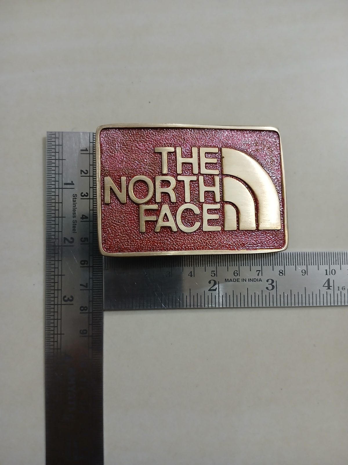 The North Face Vintage Belt Buckle – With ruler for size The North Face vintage belt buckle – with ruler for size