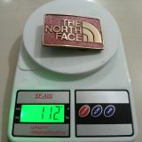 The North Face vintage belt buckle – on scale showing weight