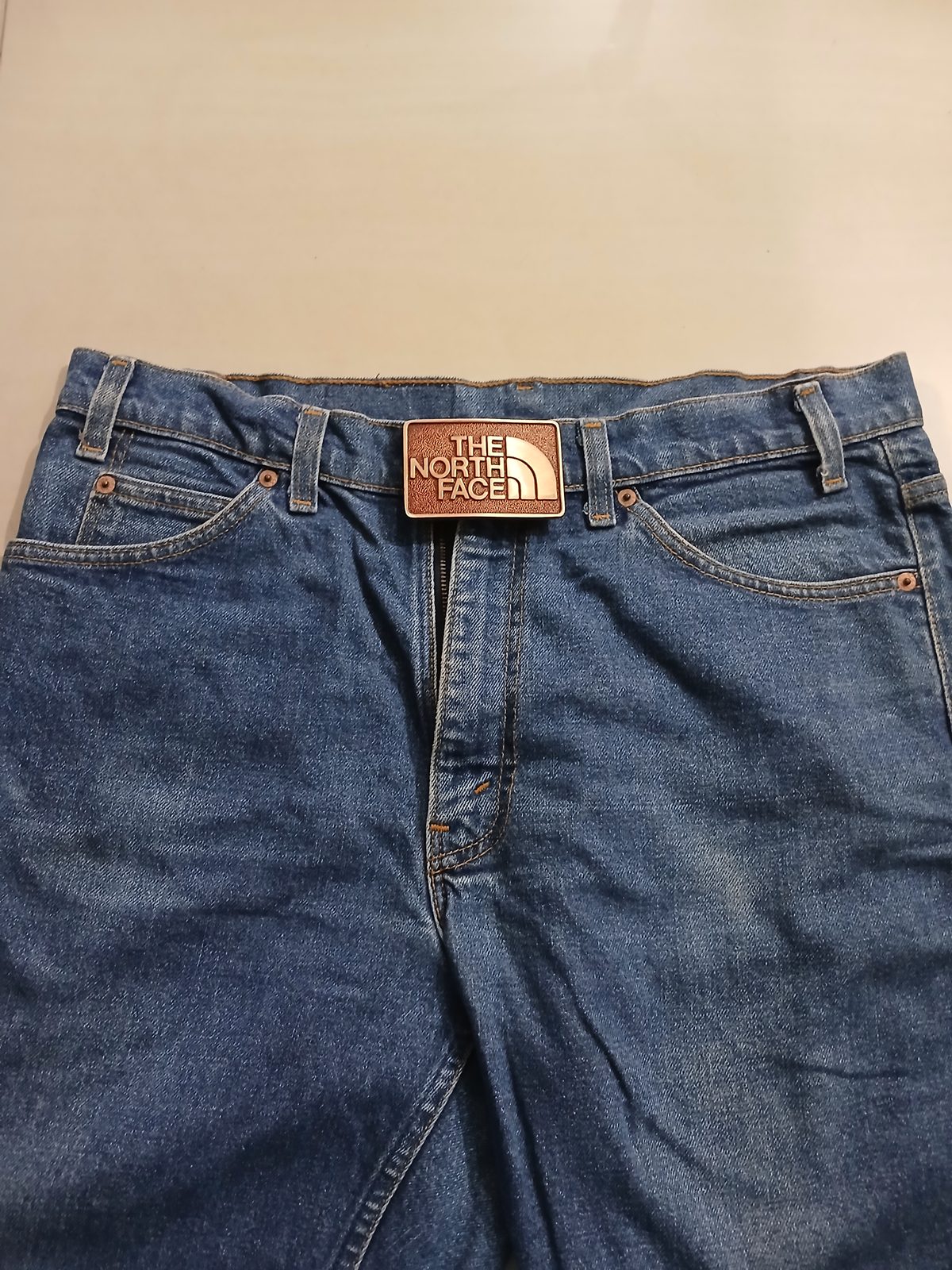 The North Face Vintage Belt Buckle – Worn on belt with jeans The North Face vintage belt buckle – worn on belt with jeans