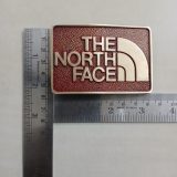 The North Face vintage belt buckle – with ruler for size