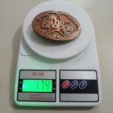 The Shoppe vintage belt buckle – on scale showing weight