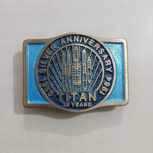Titan Silver Anniversary 1959-1984 vintage belt buckle – front view
