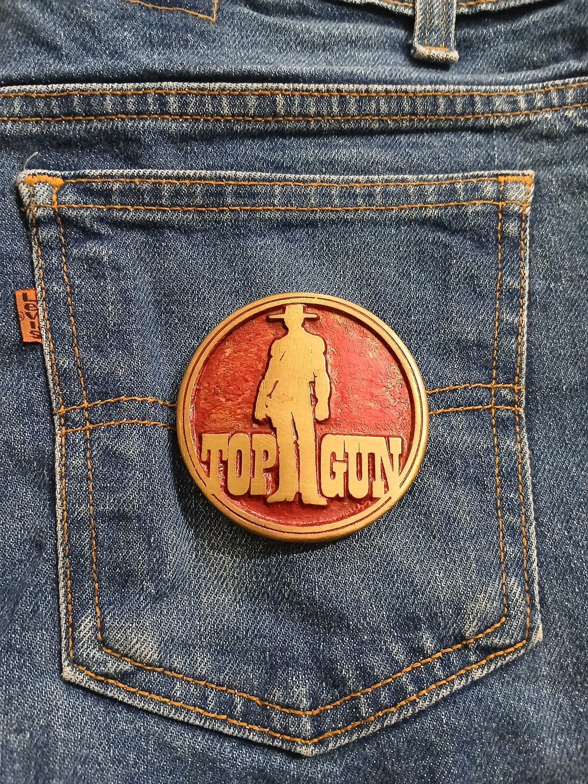 Top Gun Vintage Belt Buckle – On jeans back pocket Top Gun vintage belt buckle – on jeans back pocket