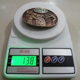 Totco Oil Workers vintage belt buckle – on scale showing weight