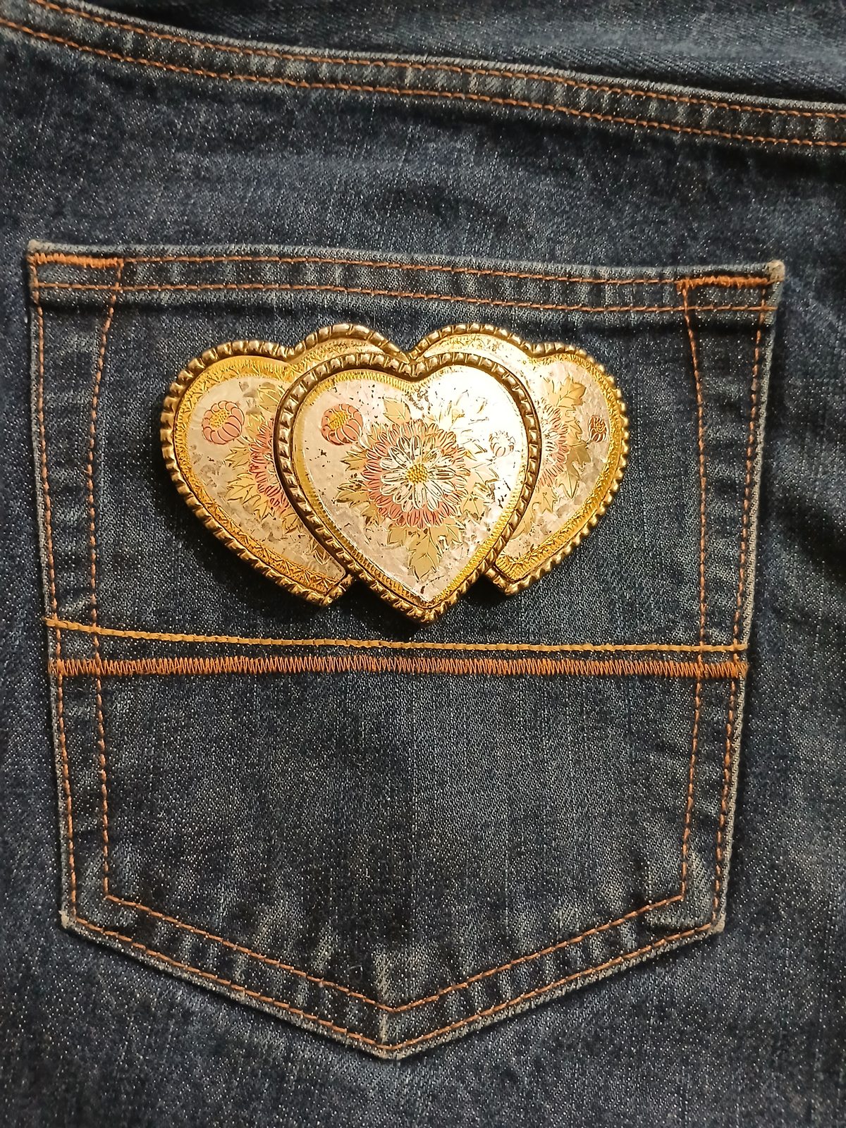 Triple Heart Floral Vintage Belt Buckle – On jeans back pocket Triple Heart Floral vintage belt buckle – on jeans back pocket
