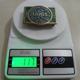 UOSS Udelhoven Oilfield Alaska vintage belt buckle – on scale showing weight