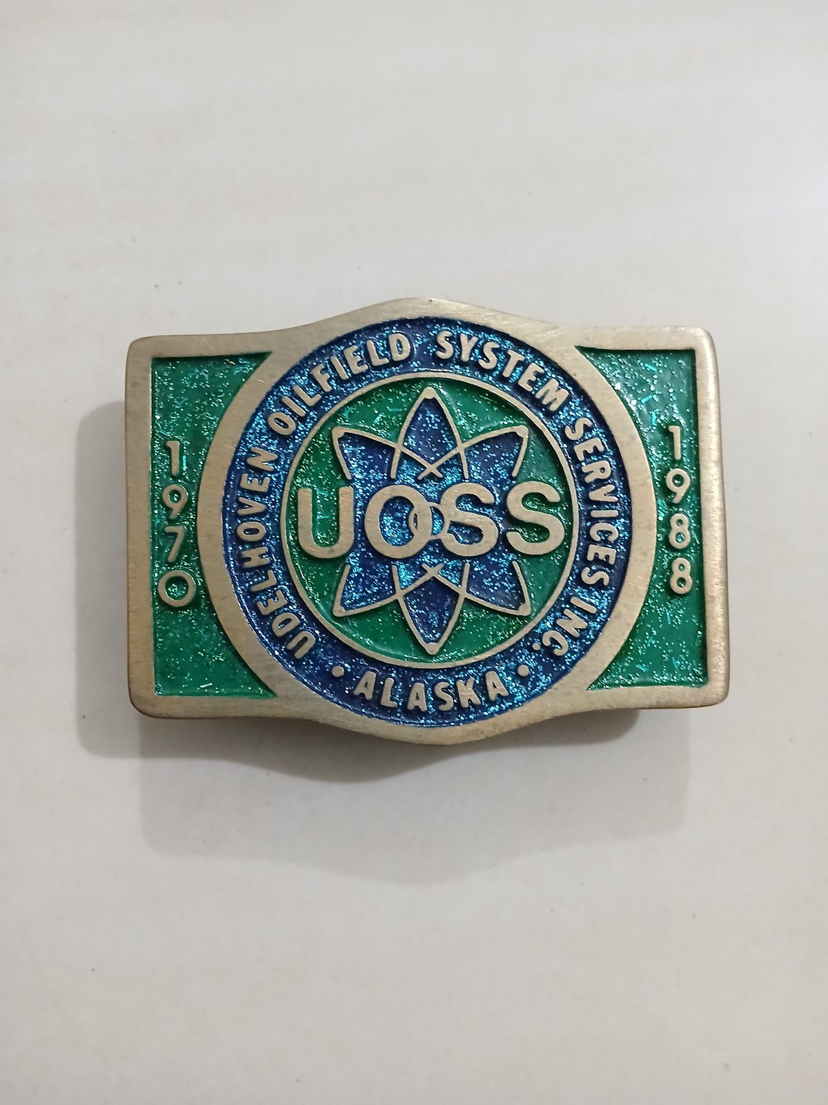 UOSS Udelhoven Oilfield Alaska Vintage Belt Buckle – Front view UOSS Udelhoven Oilfield Alaska vintage belt buckle – front view