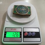 UOSS Udelhoven Oilfield Alaska vintage belt buckle – on scale showing weight