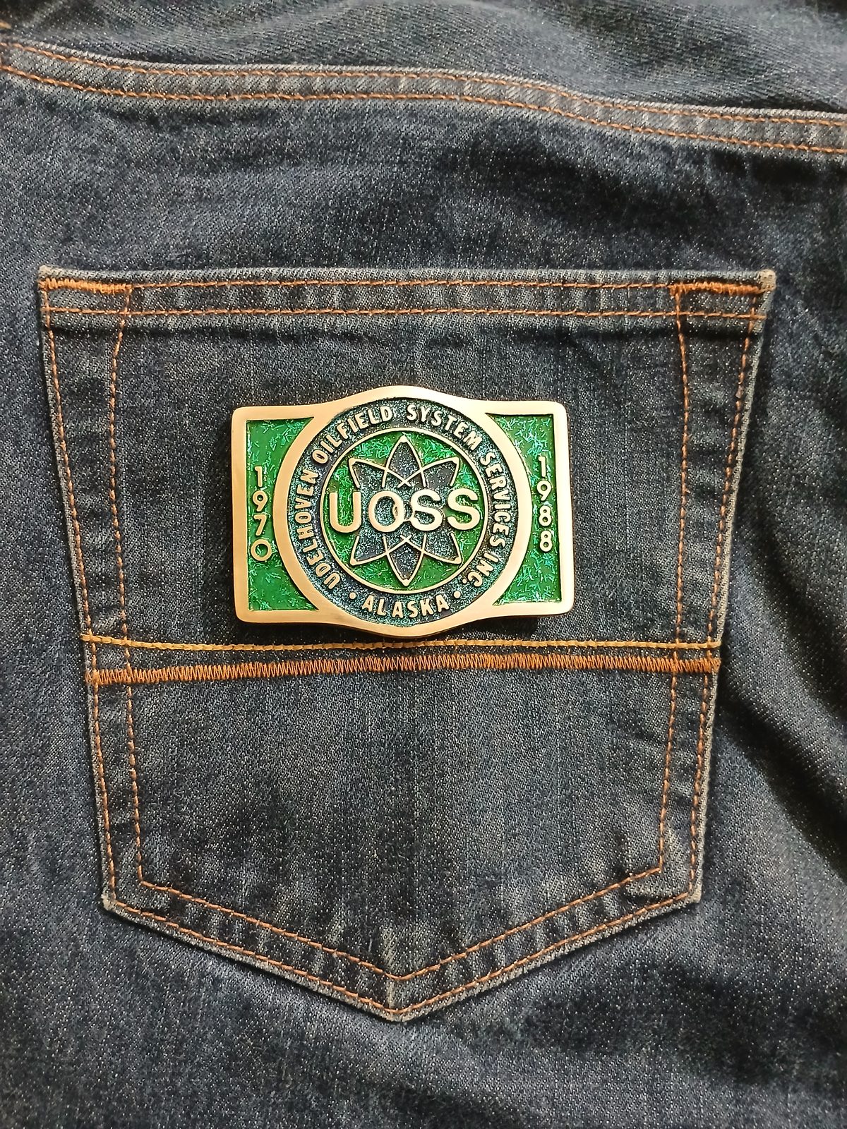 UOSS Udelhoven Oilfield Alaska Vintage Belt Buckle – On jeans back pocket UOSS Udelhoven Oilfield Alaska vintage belt buckle – on jeans back pocket